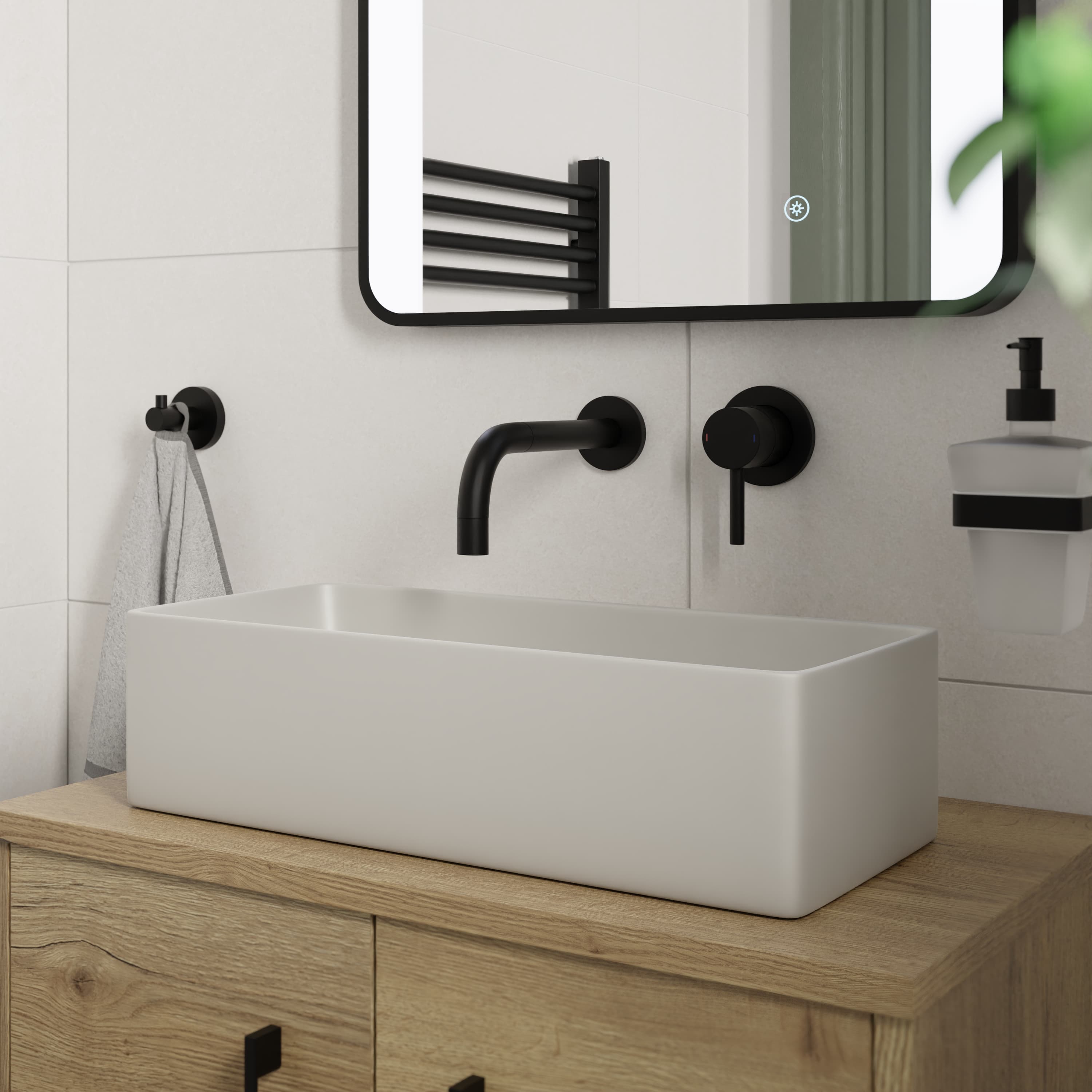 White counter top basin with wall mounted matt black tap