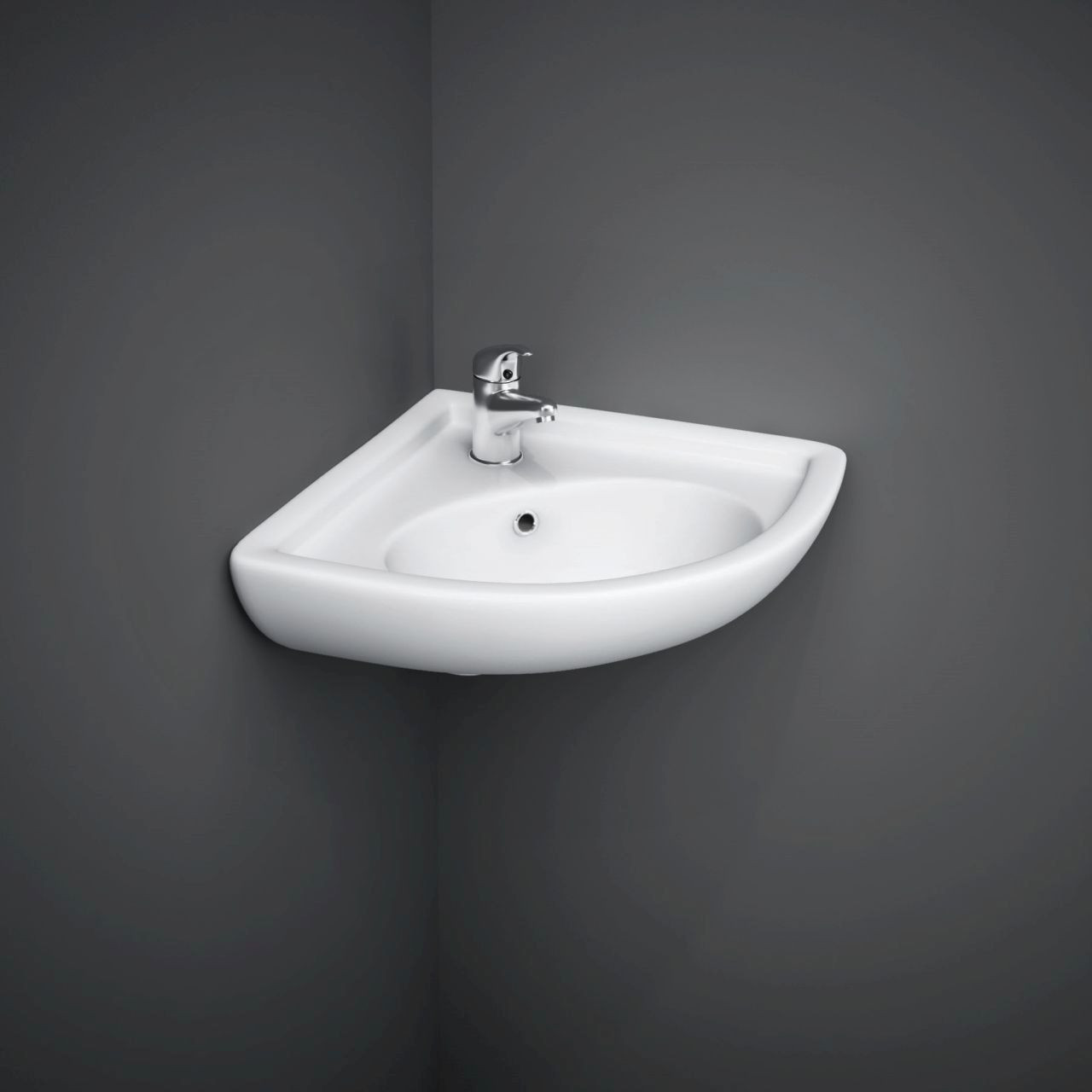 White corner basin with chrome tap