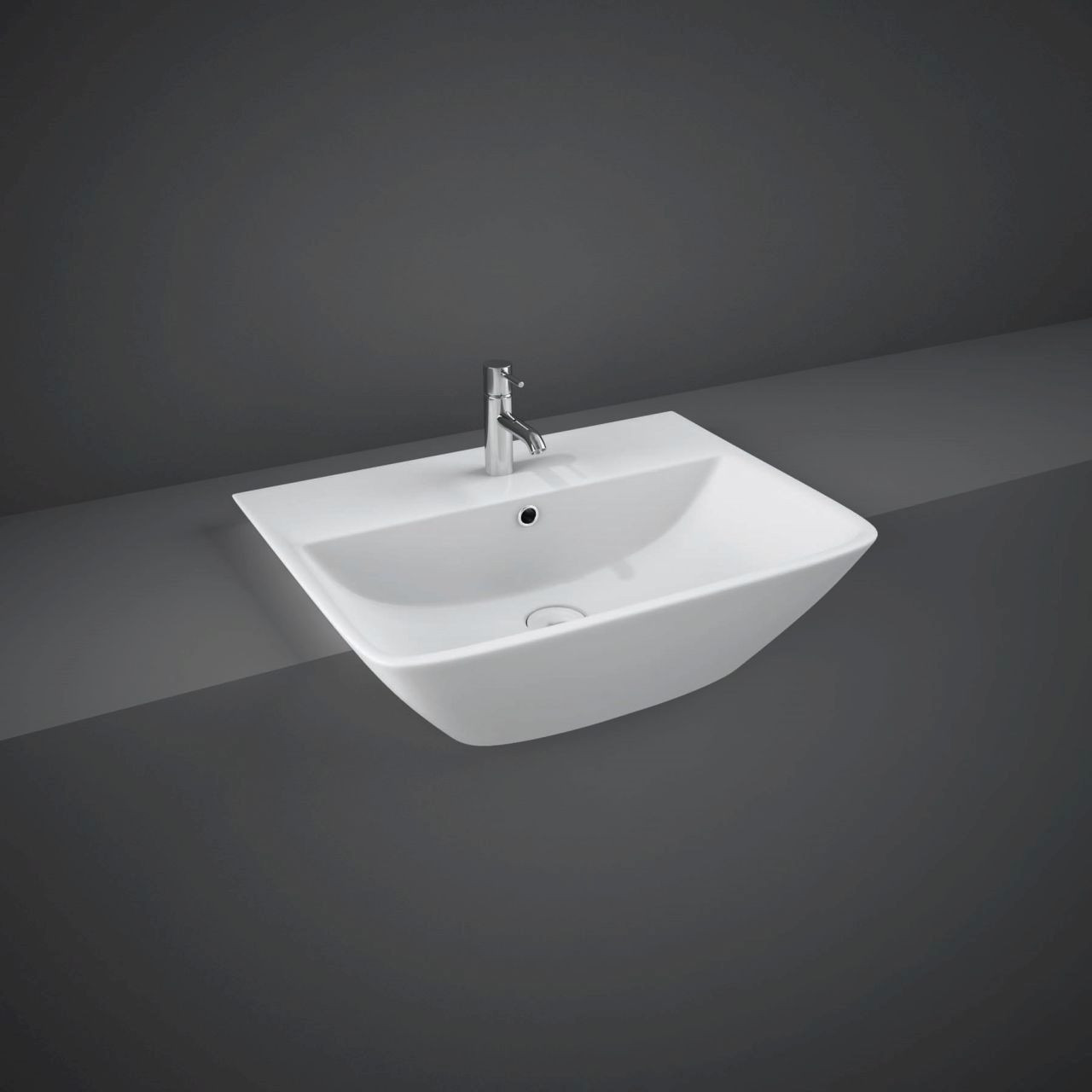 White semi recessed basin with chrome tap